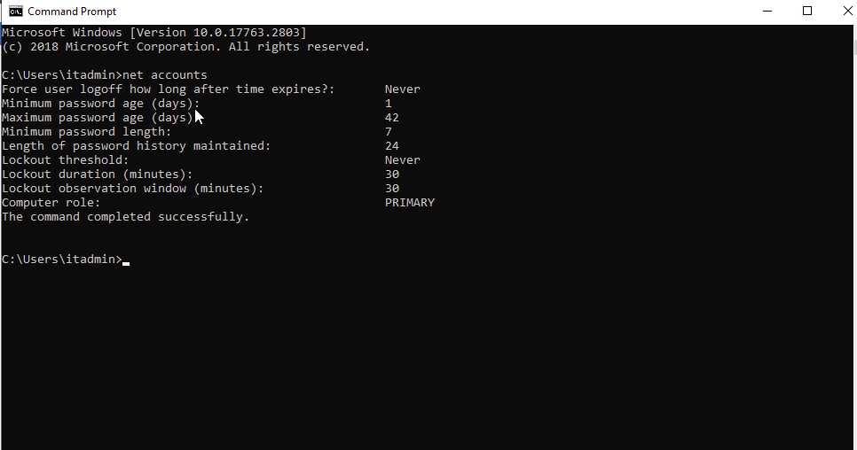 Command Prompt output of net accounts showing minimum password length 7 and lockout threshold Never